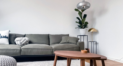 grey walls with couch